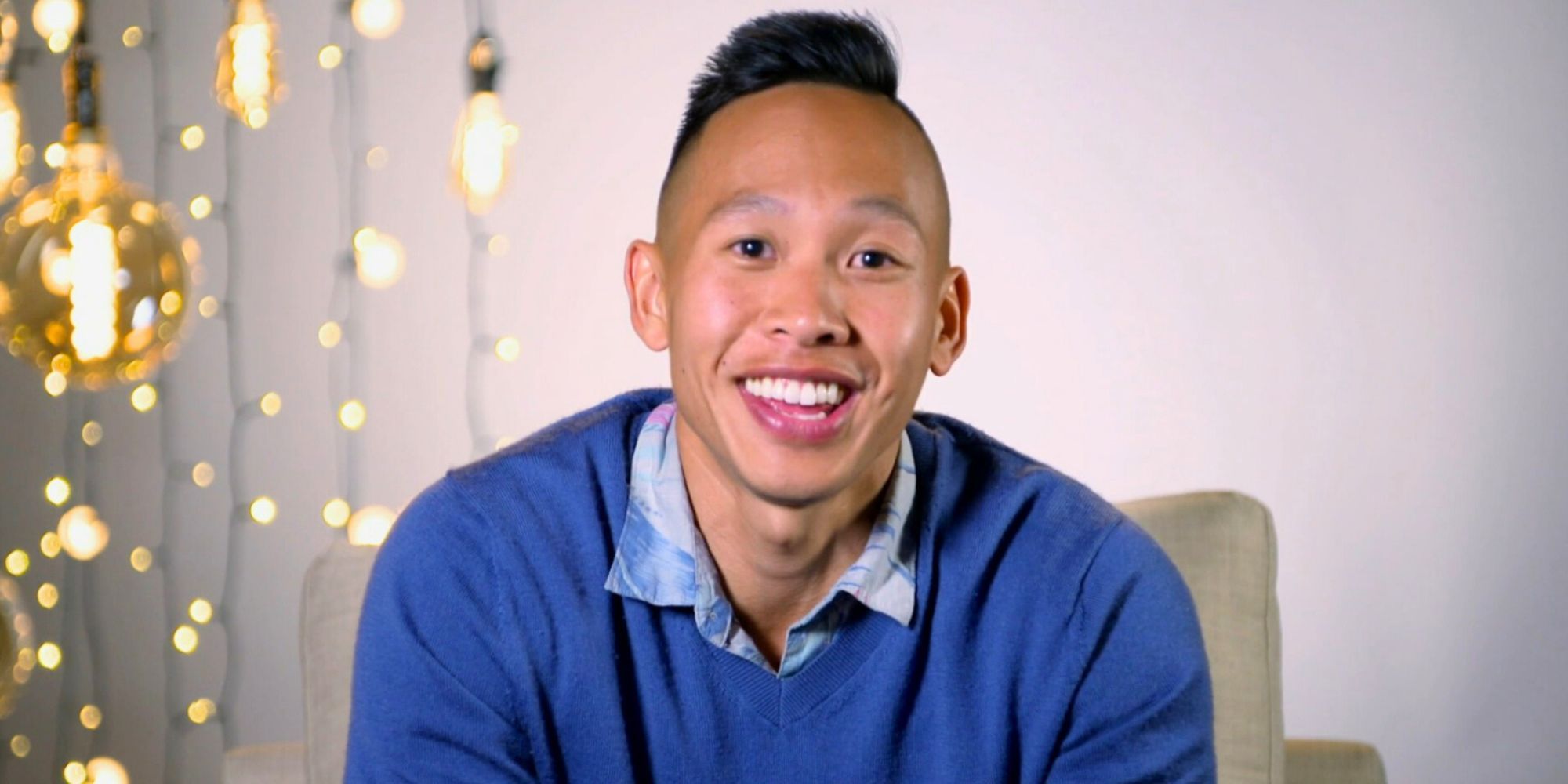 Binh Trinh from Married at First Sight Season 15 in blue shirt for interview