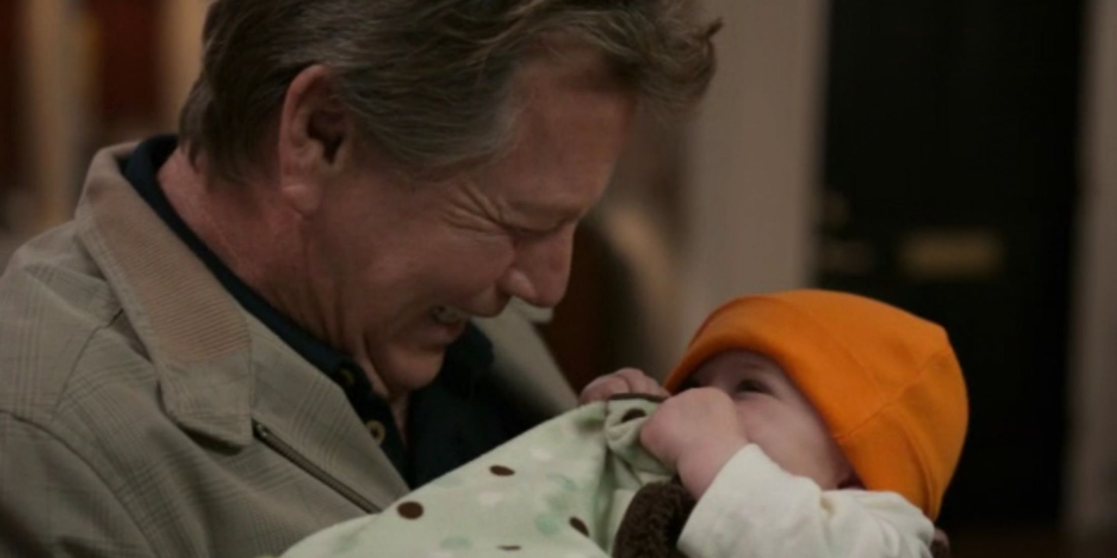 Brennans father holding baby Christine in Bones