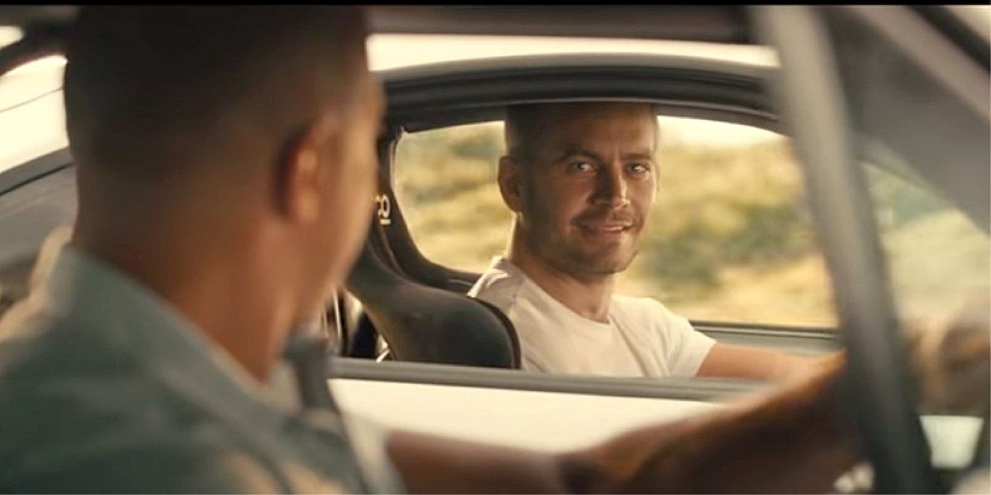 Brian (Paul Walker) from Furious 7 looking in his car at Dom Toretto (Vin Diesel)