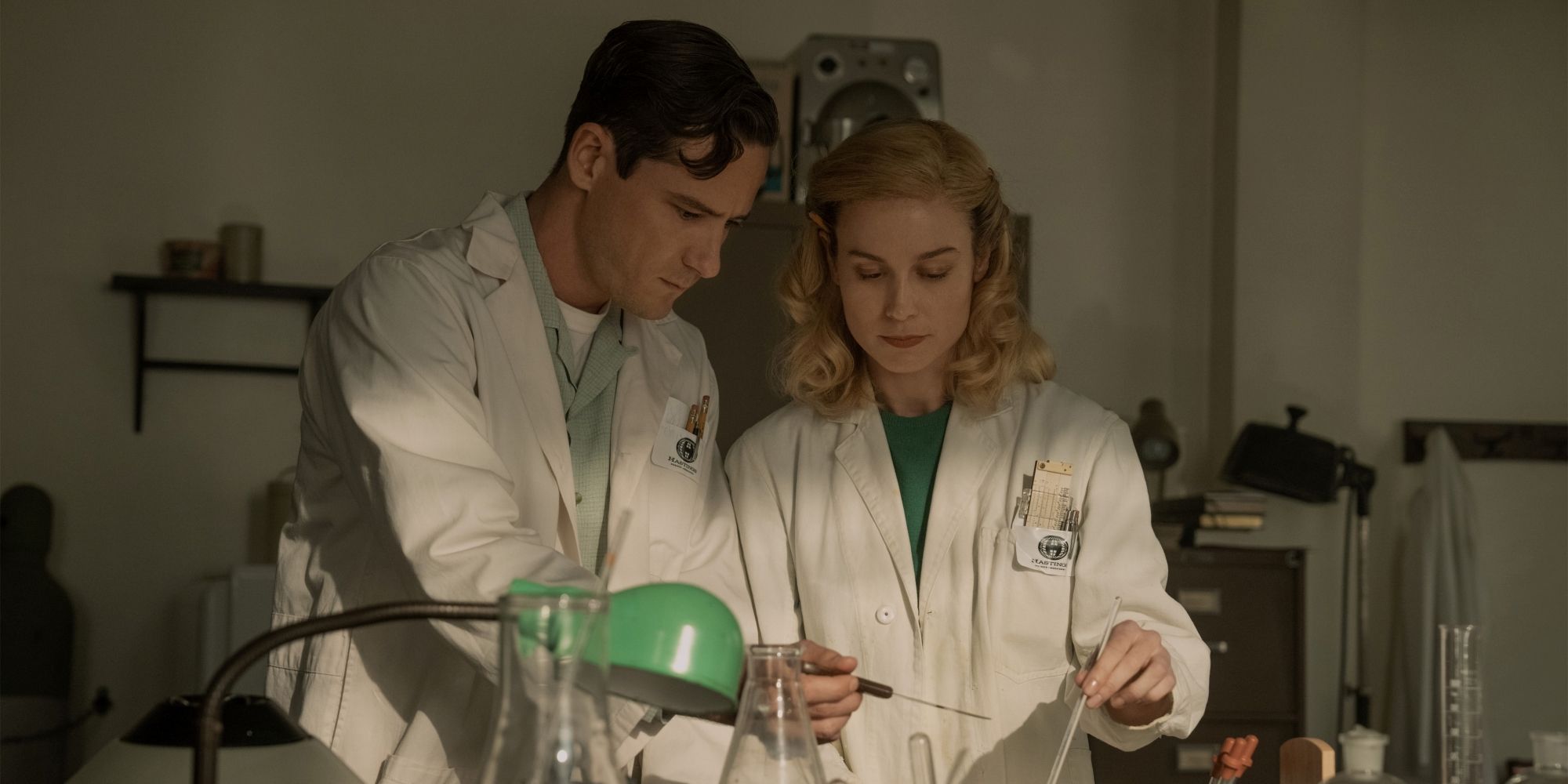 Calvin & Elizabeth Doing An Experiment In Lessons In Chemistry Episode 7.jpg