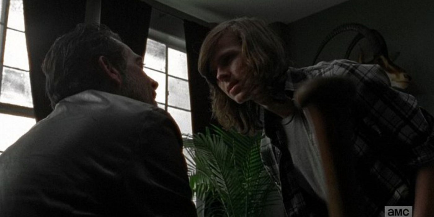 Carl looking at Negan.