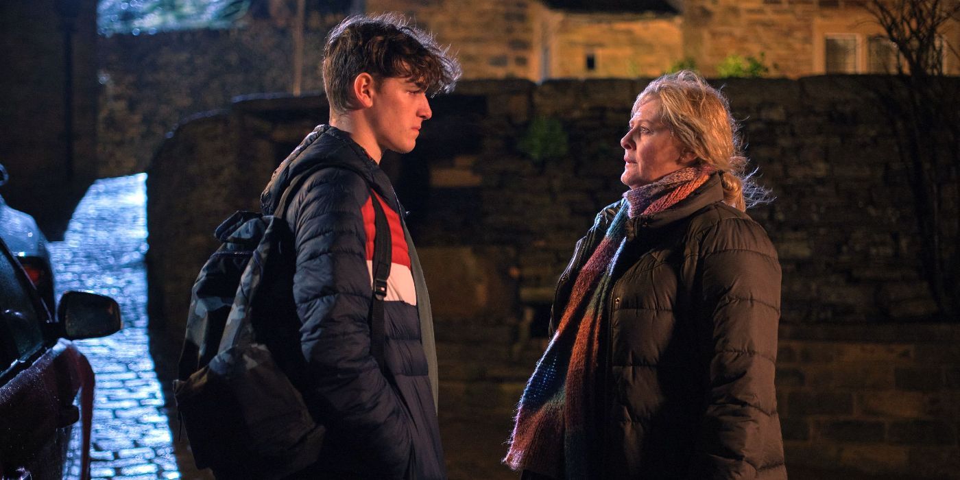 Catherine and Ryan looking worried and talking at night in Happy Valley season 3.