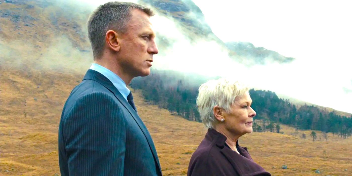 Daniel Craig and Judi Dench in profile against a sweeping mountain landscape in Skyfall