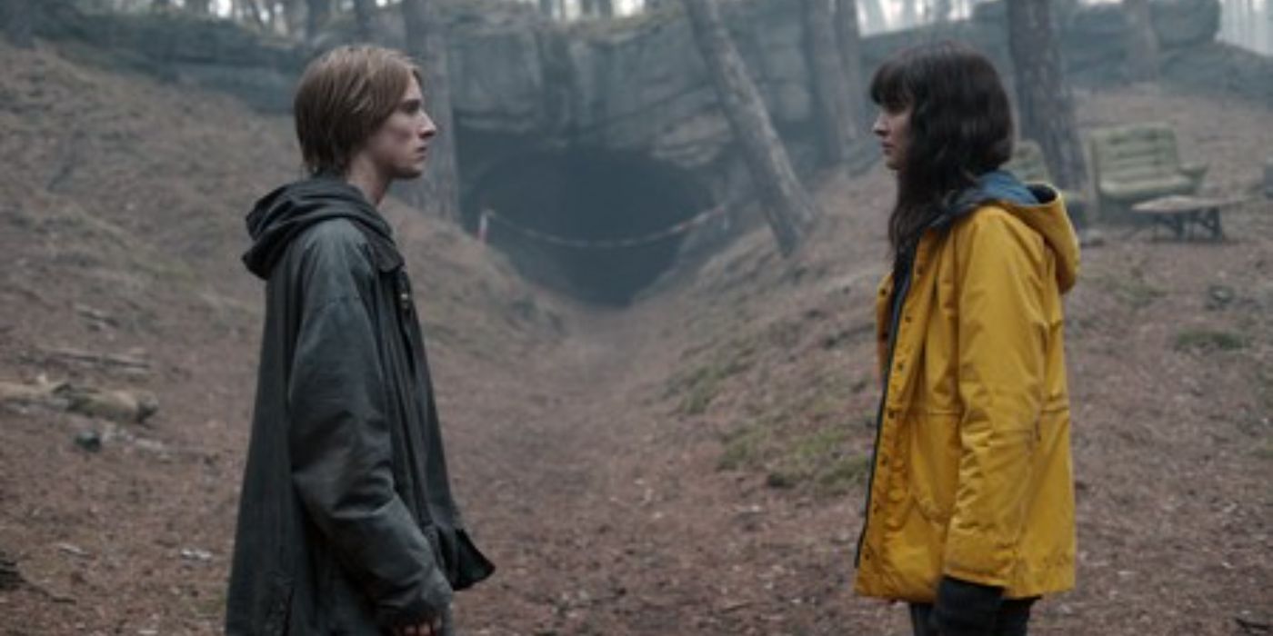 Jonas and Martha from Dark staring at each other in the woods