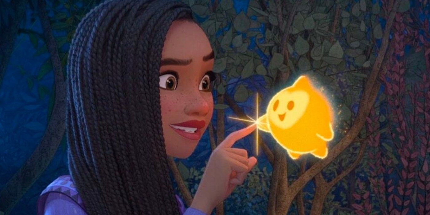 Asha y una estrella se tocan los dedos en Disney's Wish.