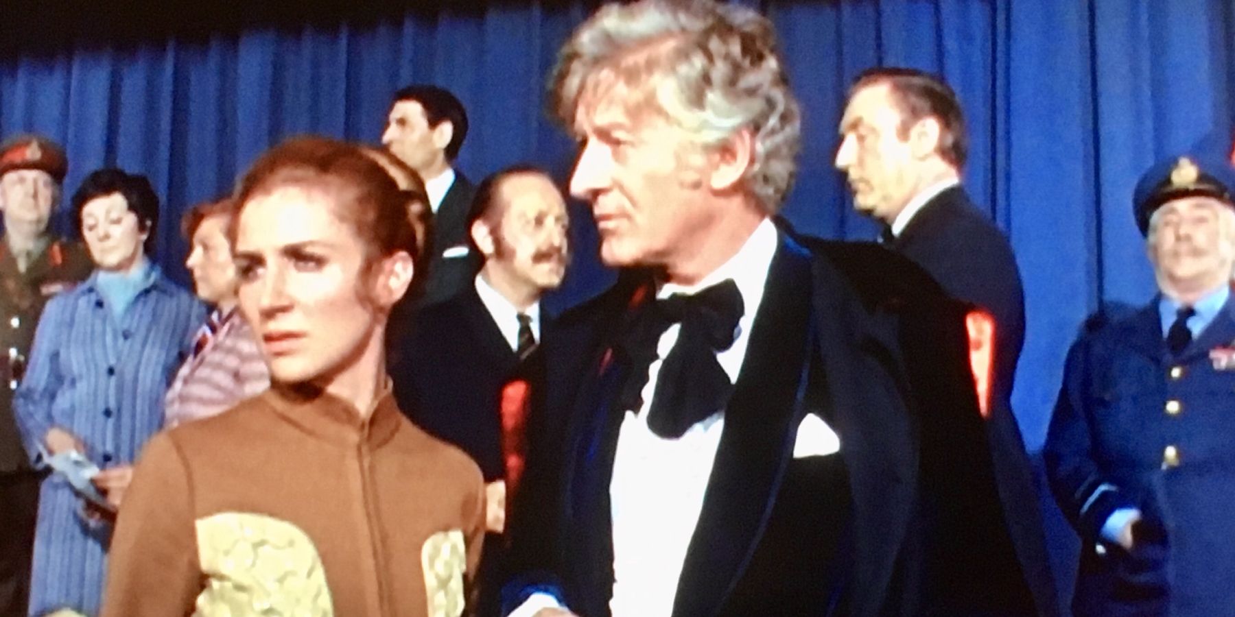 Caroline John and Jon Pertwee as Liz Shaw and the Third Doctor surrounded by waxworks