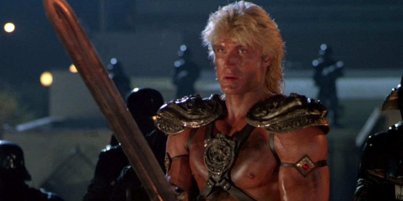 Dolph Lundgren holding a sword in the live action Masters of the Universe