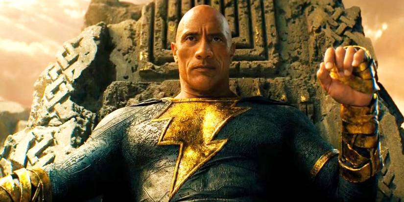 Dwayne Johnson as Black Adam sitting on his throne in Black Adam