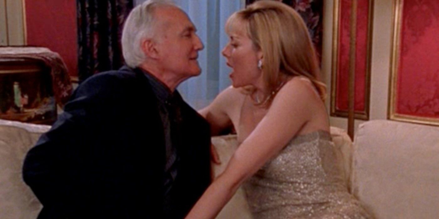Bill McHugh and Kim Cattrall as Ed and Samantha sitting down and staring into each other's eyes in Sex and the City