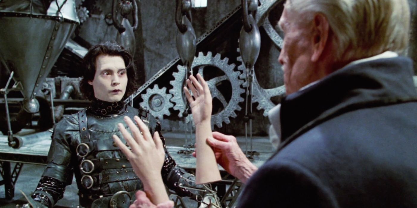 Edward Scissorhands and the inventor showing him his hands