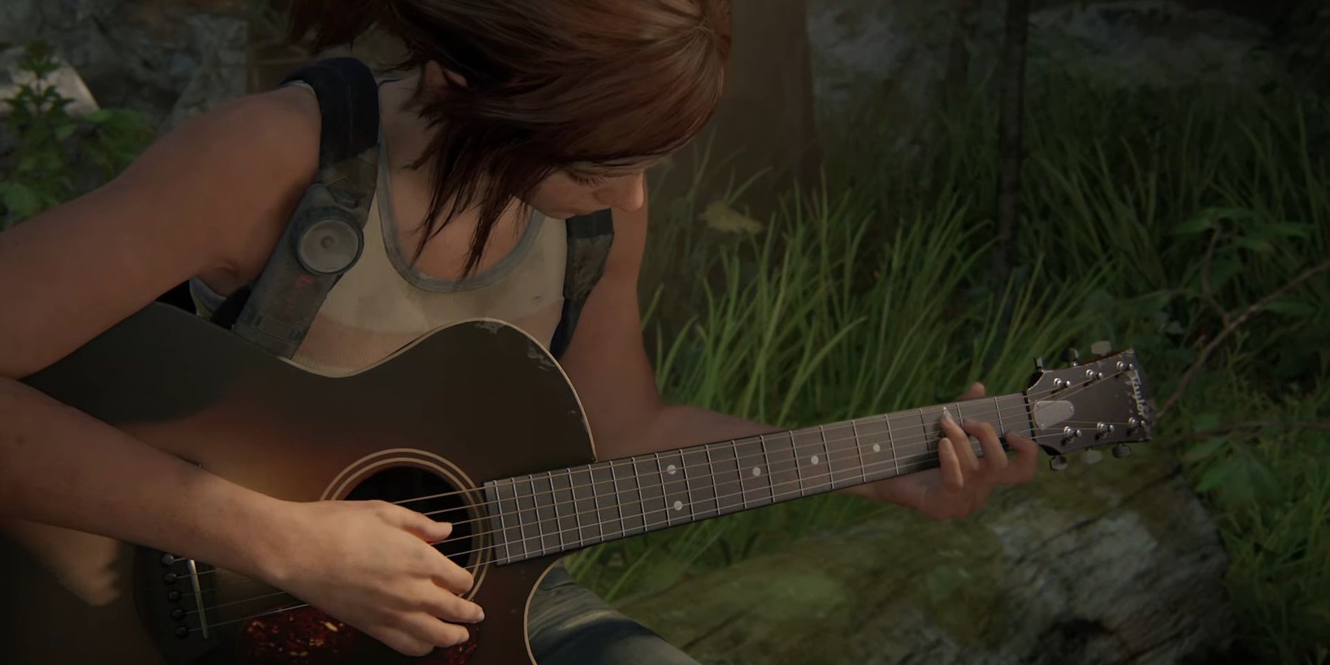 Ellie playing the guitar in The Last of Us Part II