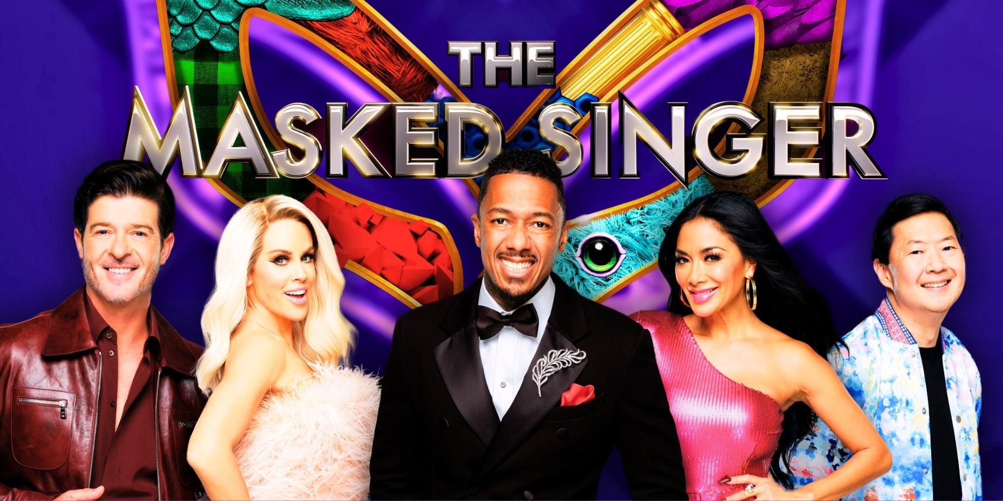 The Masked Singer logo above host Nick Cannon and panelists Robin Thicke, Jenny McCarthy, Nicole Scherzinger and Ken Jeong
