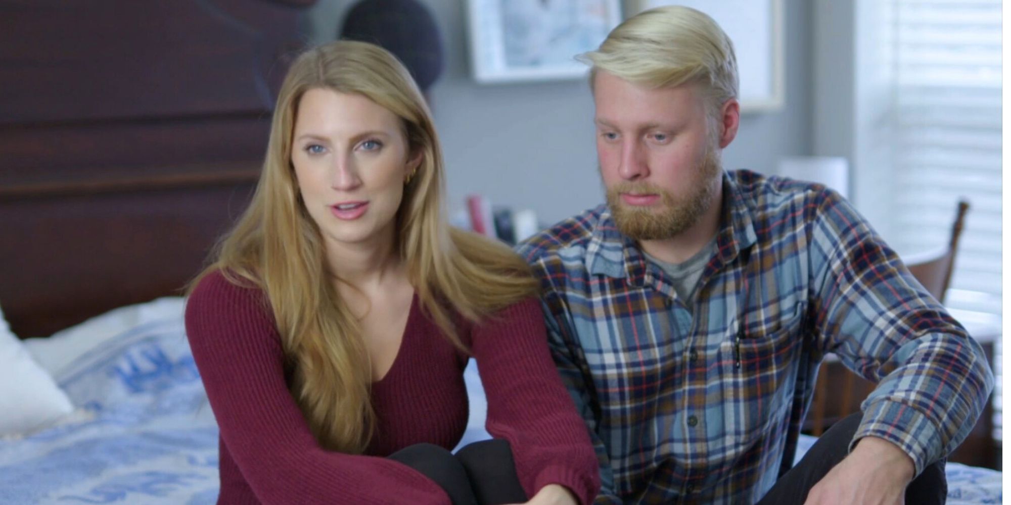 Ethan and Olivia Plath from Welcome to Plathville sitting on couch for interview