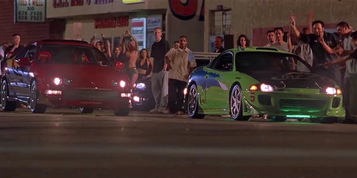 Two cars line up for a drag race in The Fast and the Furious.
