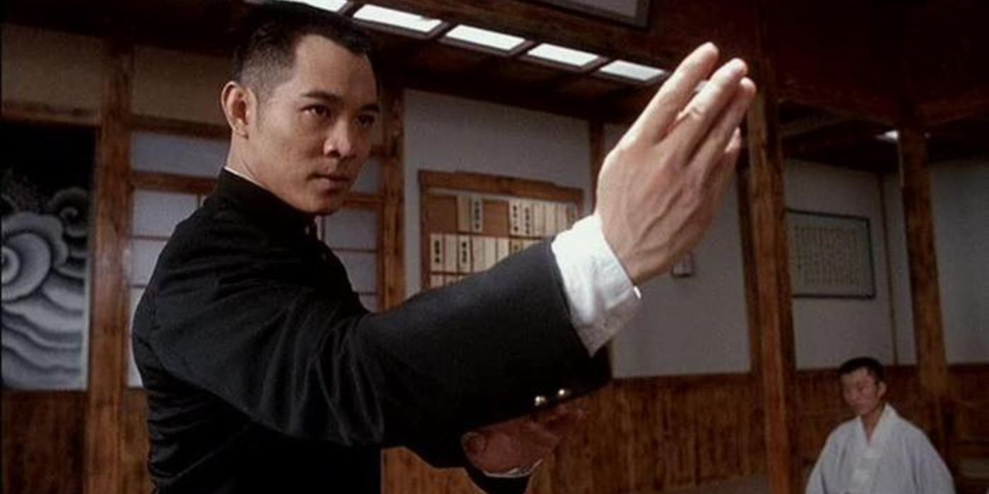 Chen Zhen focused and adopting a karate stance inside a Japanese dojo in Fist of Legend