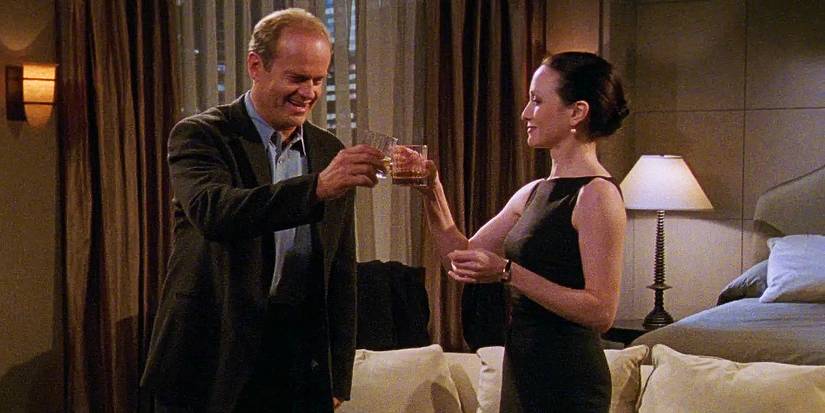Frasier and Lilith making a toast in a hotel room in Frasier