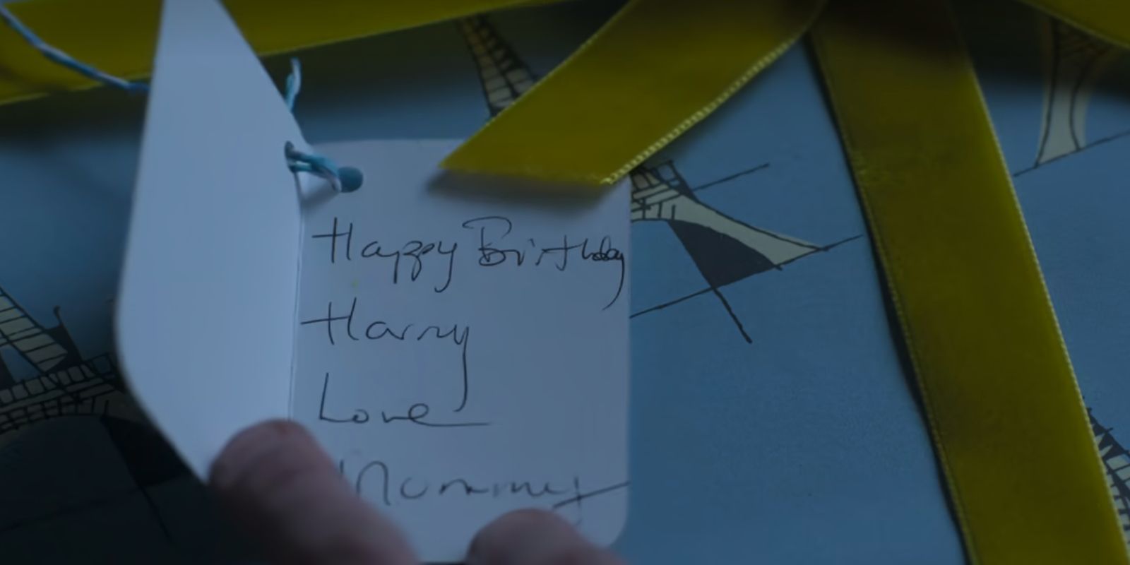 A gift tag to Prince Harry with Princess Diana's handwriting in The Crown season 6.