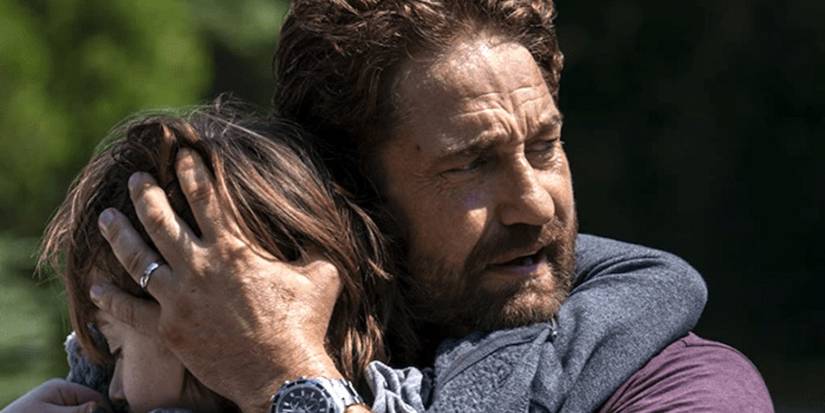 Gerard Butler holds his son in Greenland 