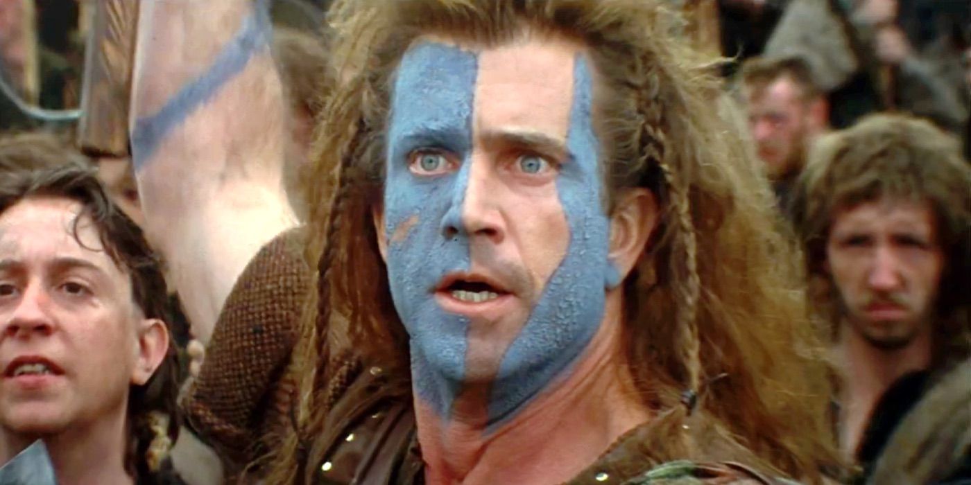 Mel Gibson como William Wallace com pintura facial azul em Coração Valente.