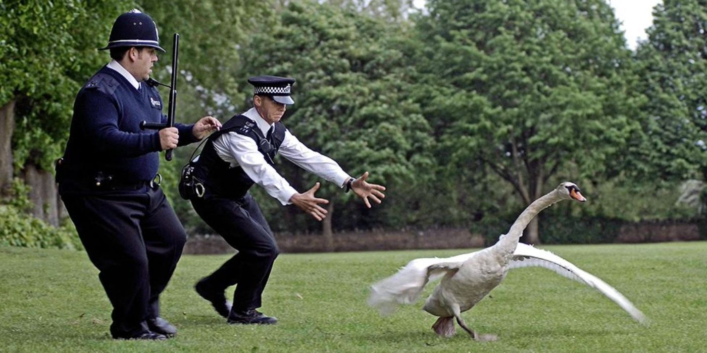Hot Fuzz Sergeant Angel and Danny chasing a swan on a field