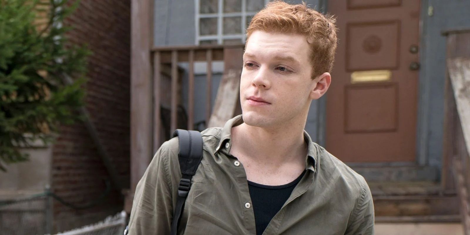 Ian Gallagher looks on from Shameless