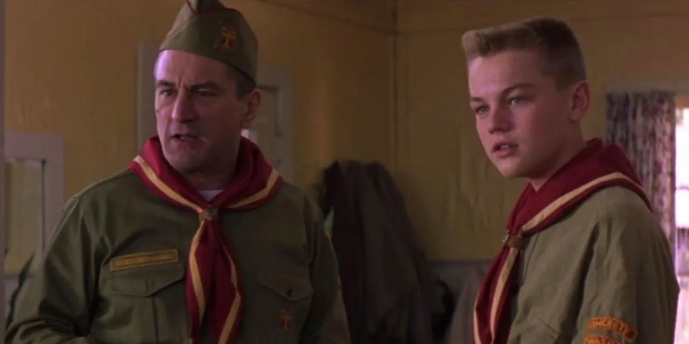 Dwight Hansen and Tony in boy scouts uniforms, looking forward in This Boy's Life. 