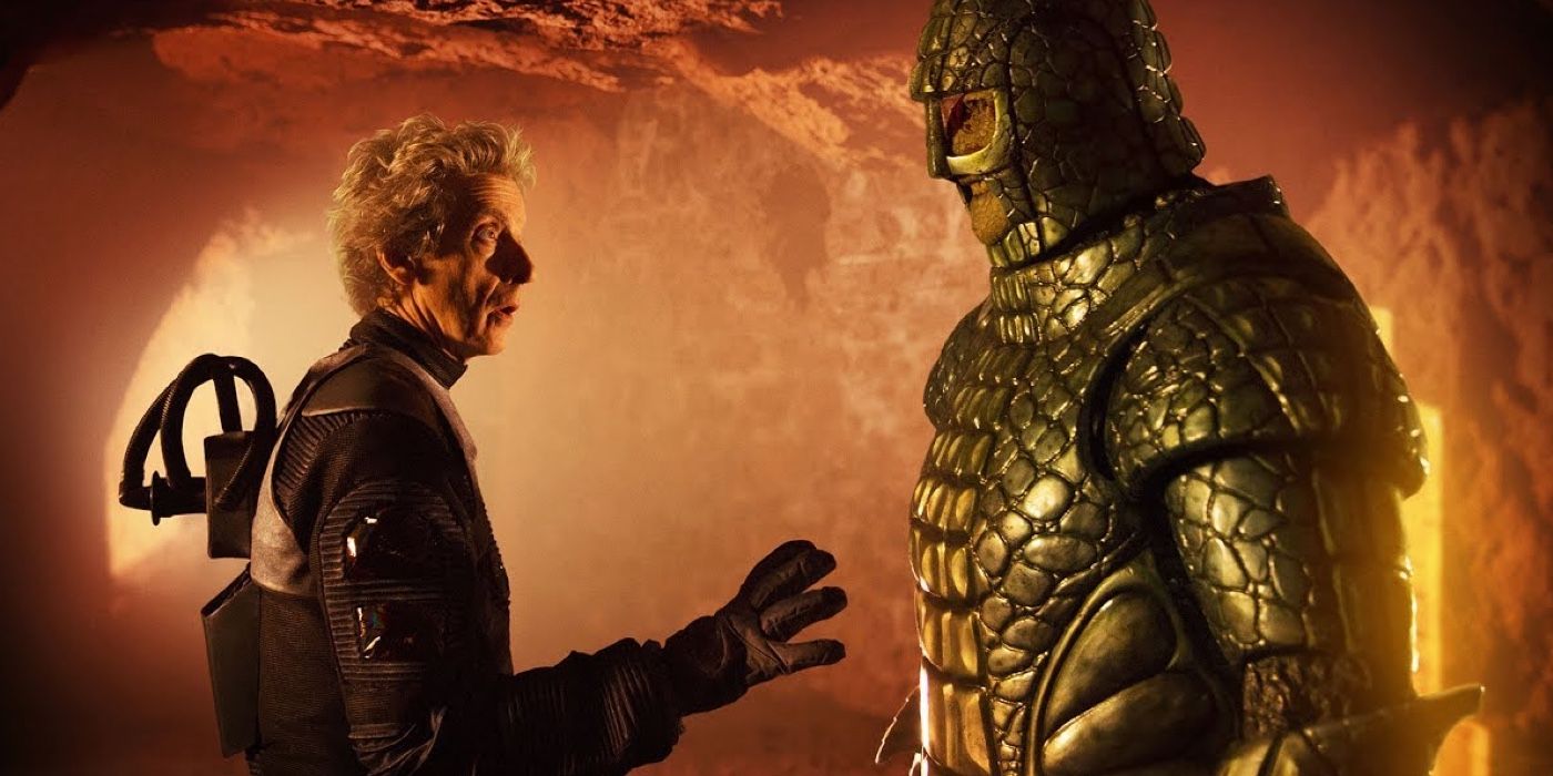 The Twelfth Doctor with his hand out to an Ice Warrior in Doctor Who.