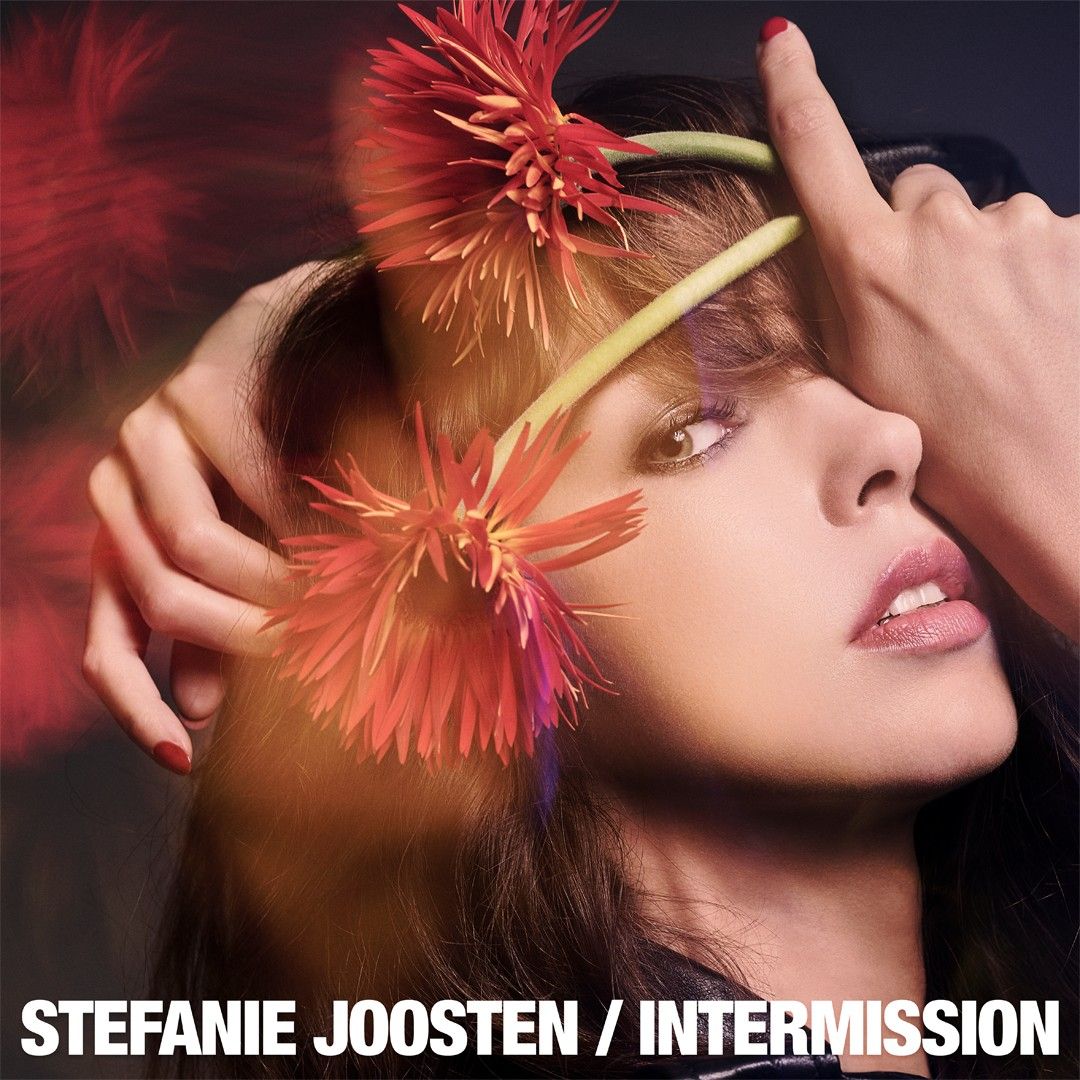 Intermission album cover showing Stefanie Joosten holding two flowers.