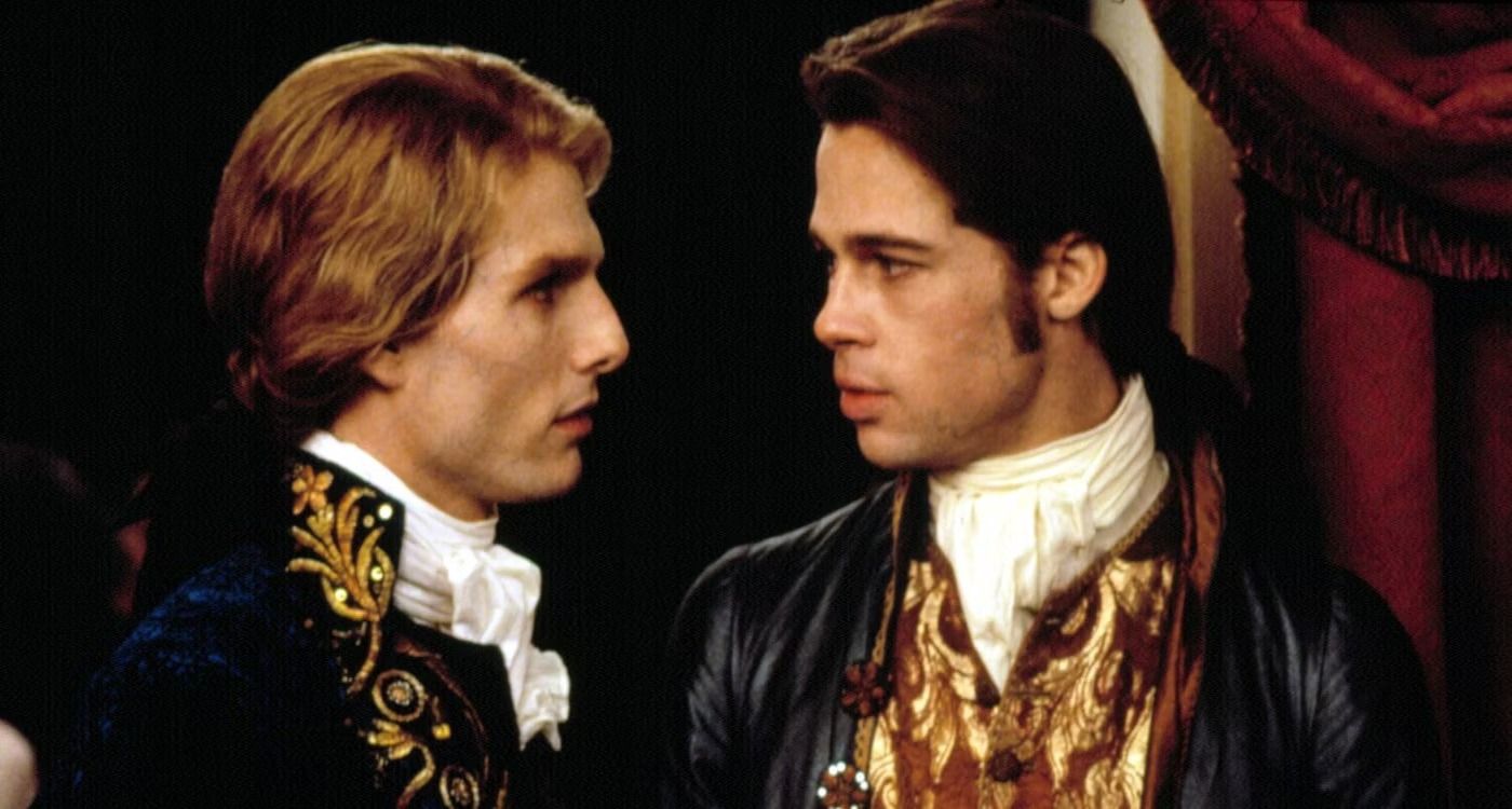 Lestat (Tom Cruise) and Louis (Brad Pitt) stare at each other in Interview with the Vampire.