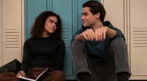 Ginny and Marcus are sitting and talking.