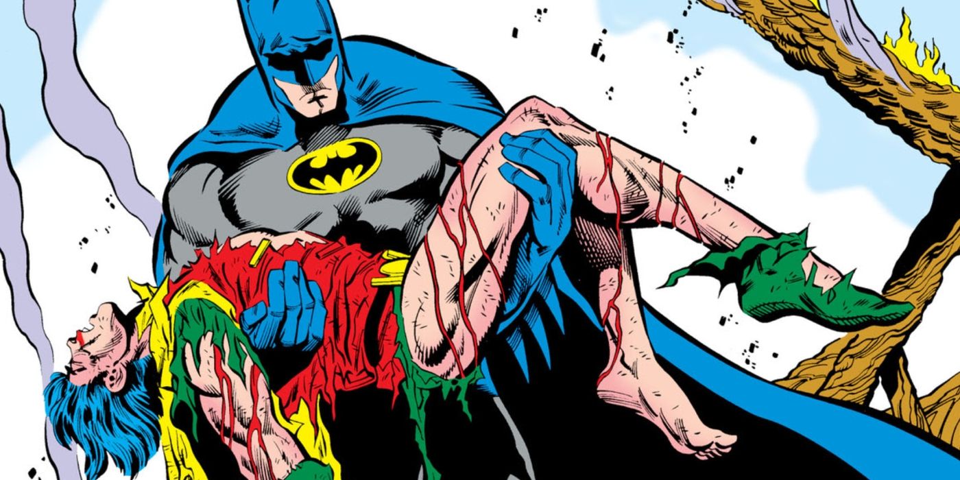 Um Batman perturbado carregando o corpo flácido e ensanguentado de Jason Todd em "A Death in the Family".