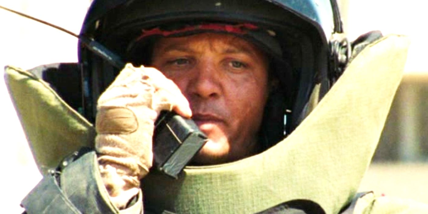 Jeremy Renner wearing a bomb suit and talking into a radio in The Hurt Locker.