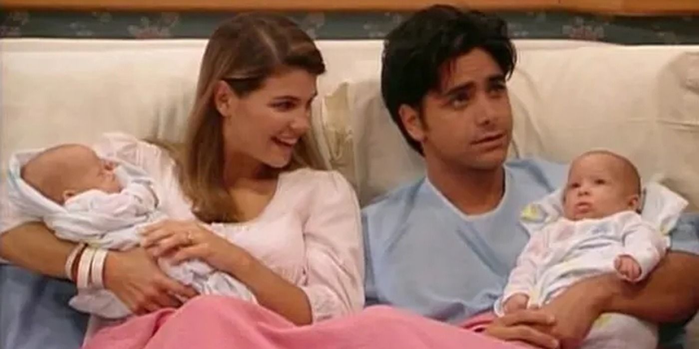 Jesse and Becky holding their twins in Full House