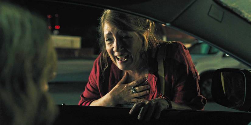 Joan talking dramatically to Annie through the car window in Hereditary