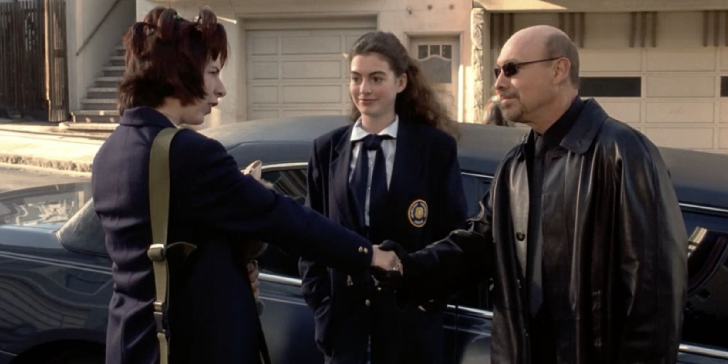 Joe meets Lily and shakes her hand in The Princess Diaries.