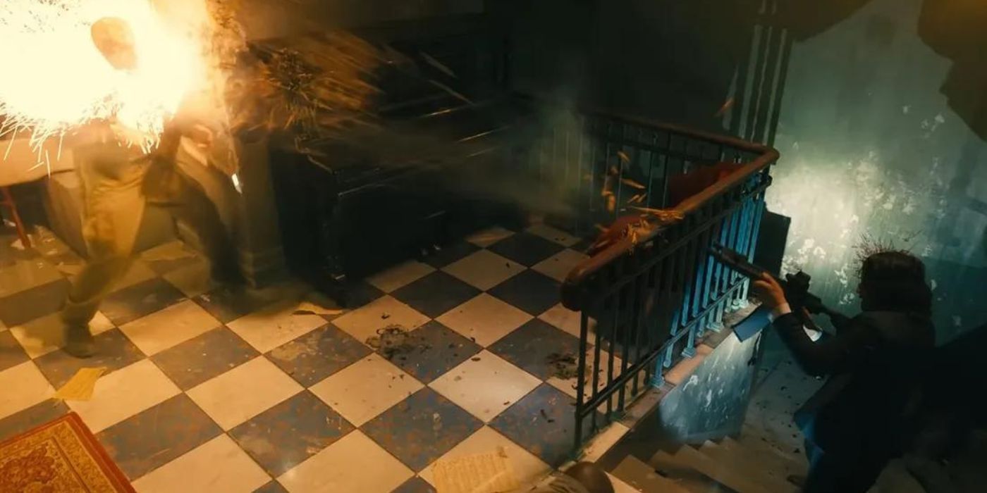 John Wick firing Dragon's Breath ammo at a man in John Wick Chapter 4