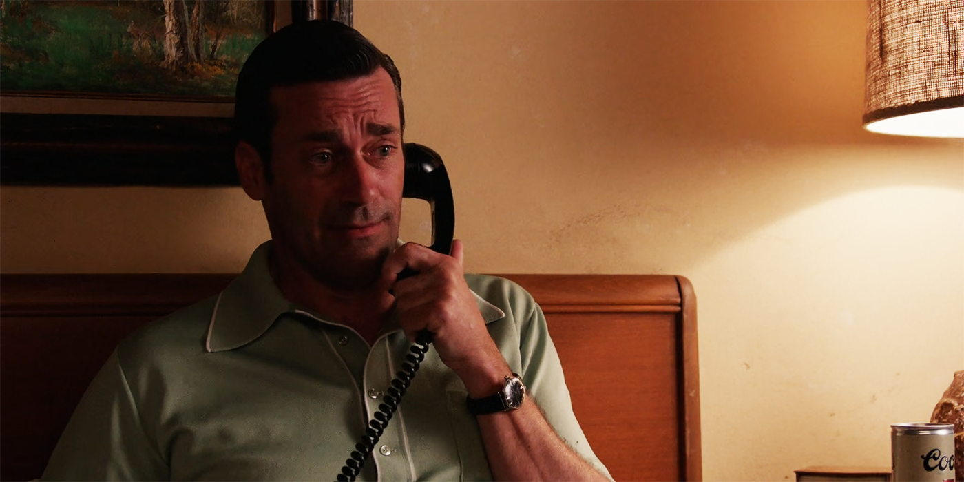 Jon Hamm talking on the phone in a scene as Don Draper from Mad Men