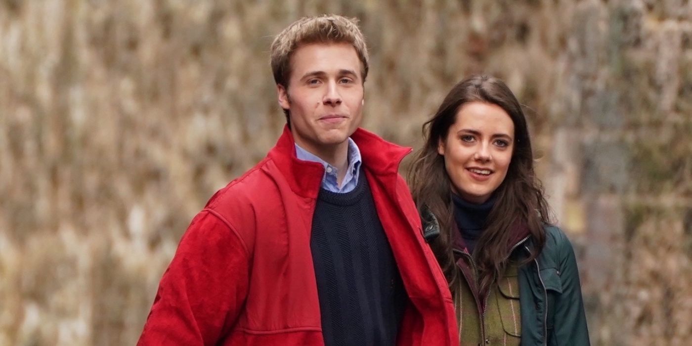 Kate Middleton and Prince William walking together in a forest in a scene from The Crown