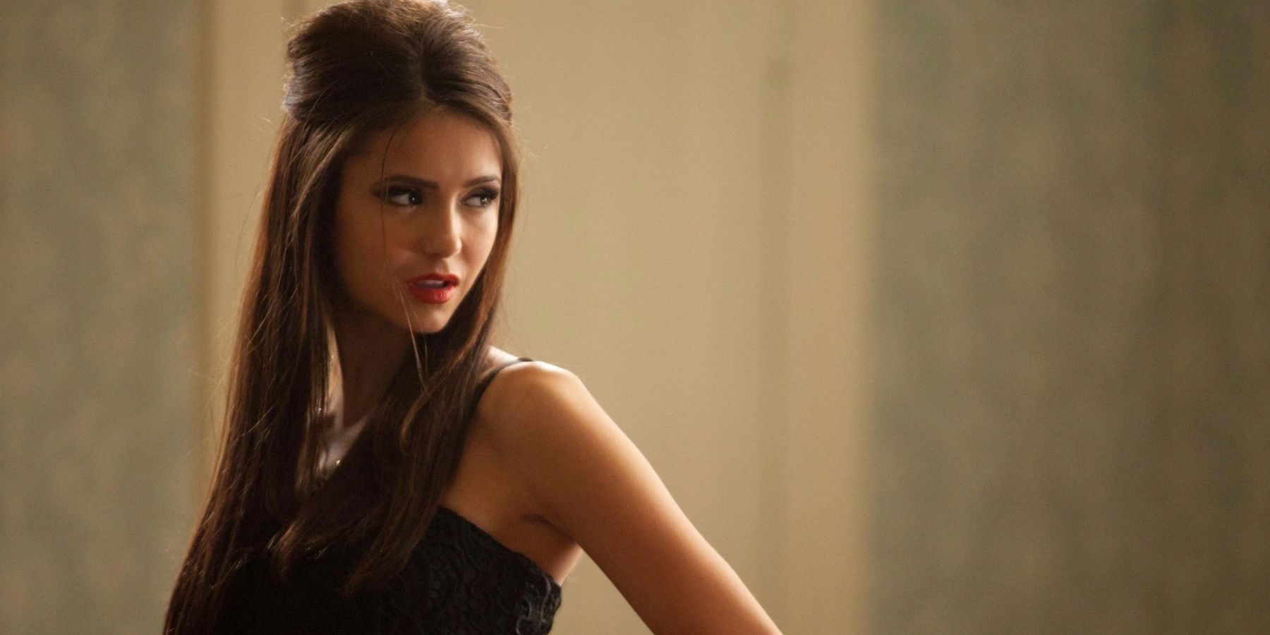 Katherine looking off to the side in the Vampire Diaries episode Masquerade