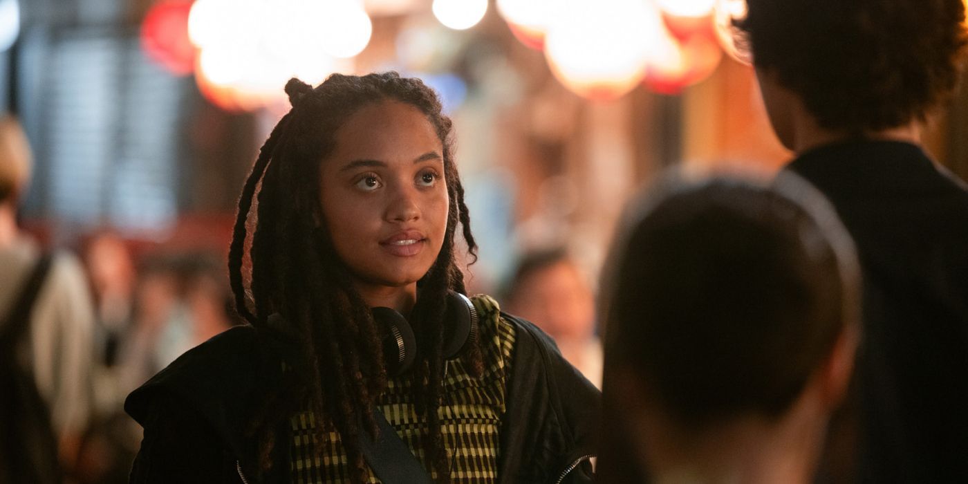 Kiersey Clemons as May looking at someone in Monarch: Legacy of Monsters