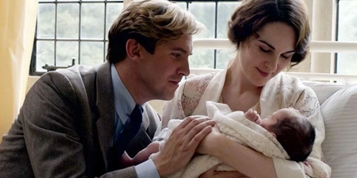 Lady Mary and Matthew Crawley with their child in Downton Abbey