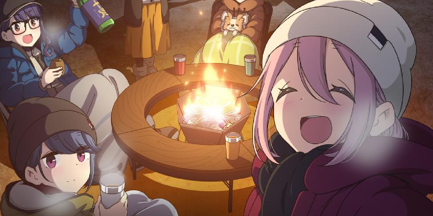 Laid-Back Camp's Main Cast Sitting By a Campfire in the anime adaptation.
