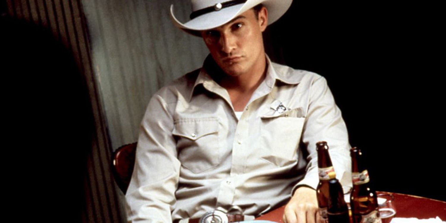 Matthew McConaughey as Buddy Deeds sitting in a saloon in Lonestar