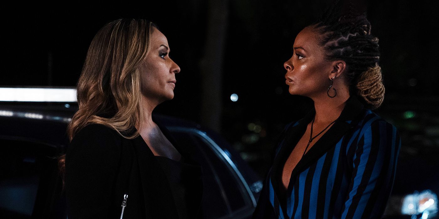 Madam staring angrily at another woman staring back at her in All the Queen&rsquo;s Men season 3.