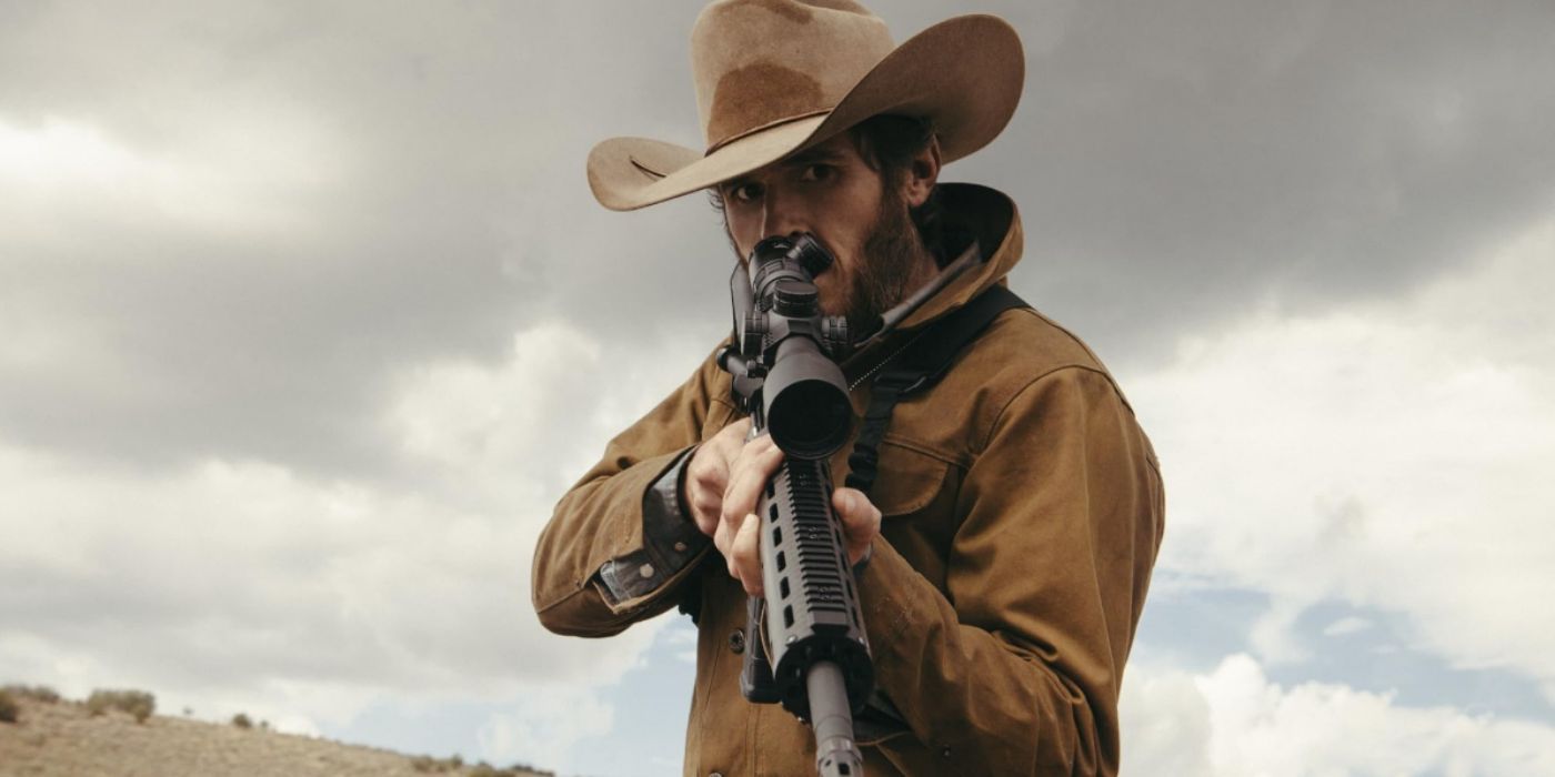 Lee Dutton (Dave Annable) pointing a gun in the Yellowstone pilot episode