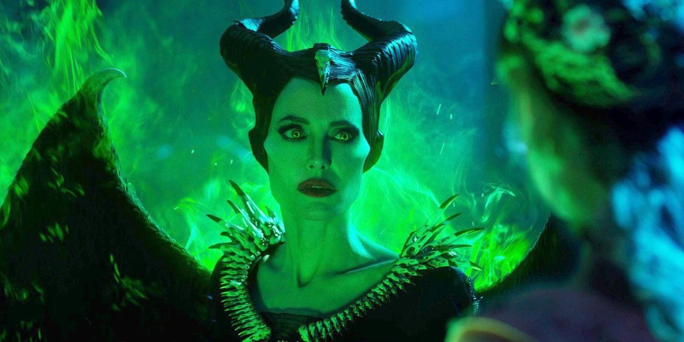 Maleficent surrounded by green smoke