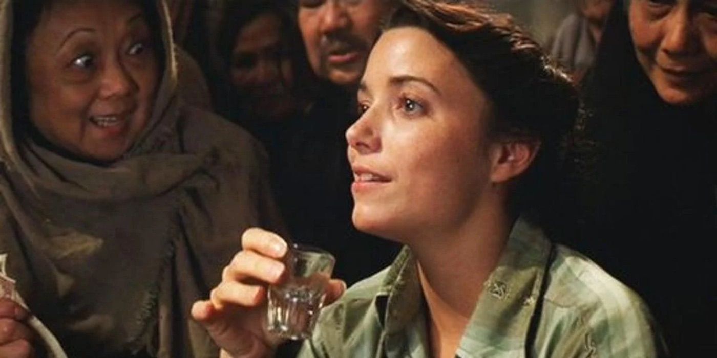 Marion in a drinking contest in Raiders of the Lost Ark.