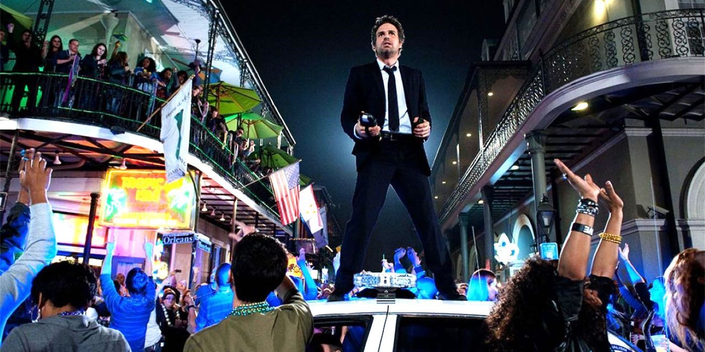 Mark Ruffalo as Dylan Rhodes standing on a car above a crowd In Now You See Me 2