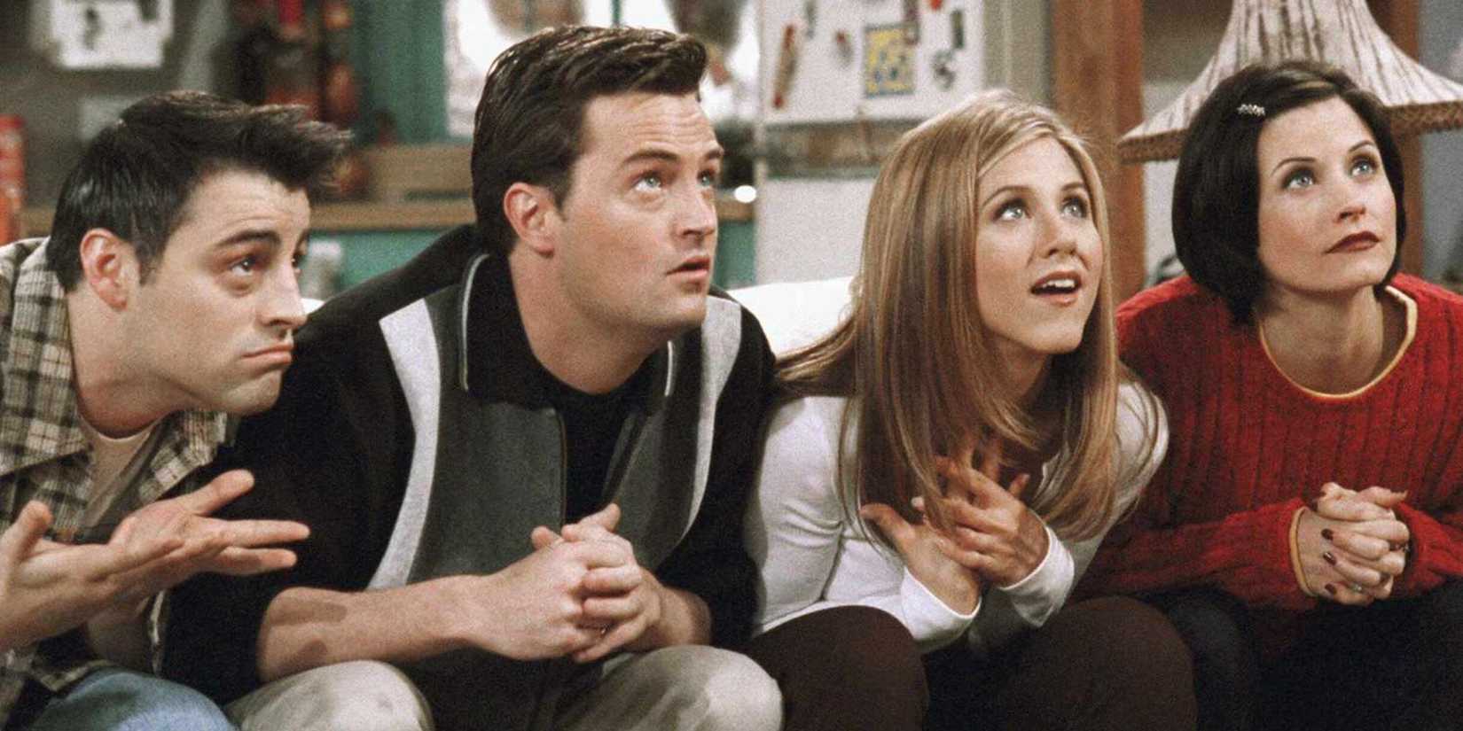 Matt LeBlanc, Matthew Perry, Jennifer Aniston and Courteney Cox playing the trivia quiz in Friends as Joey, Chandler, Rachel, and Monica