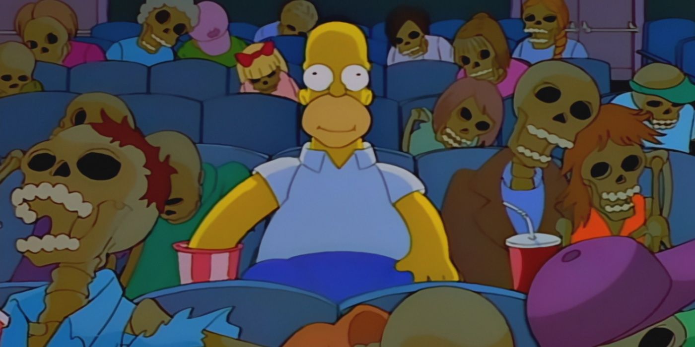 Homer eating popcorn in a theater with skeletons in The Simpsons